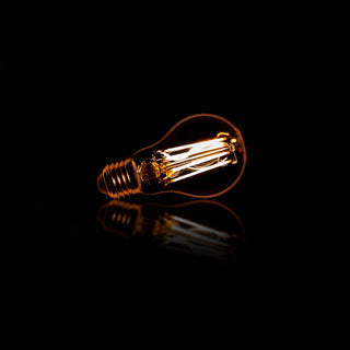 Ampoule LED à filament A60 poire - E27, verre ambré, 2100K