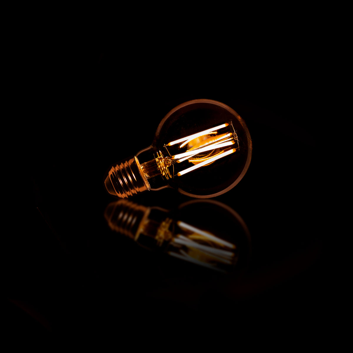 LED filament bulb G70 globe diameter 7 cm - amber glass
