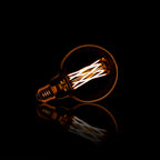 LED filament bulb G95 globe diameter 9.5 cm - amber glass