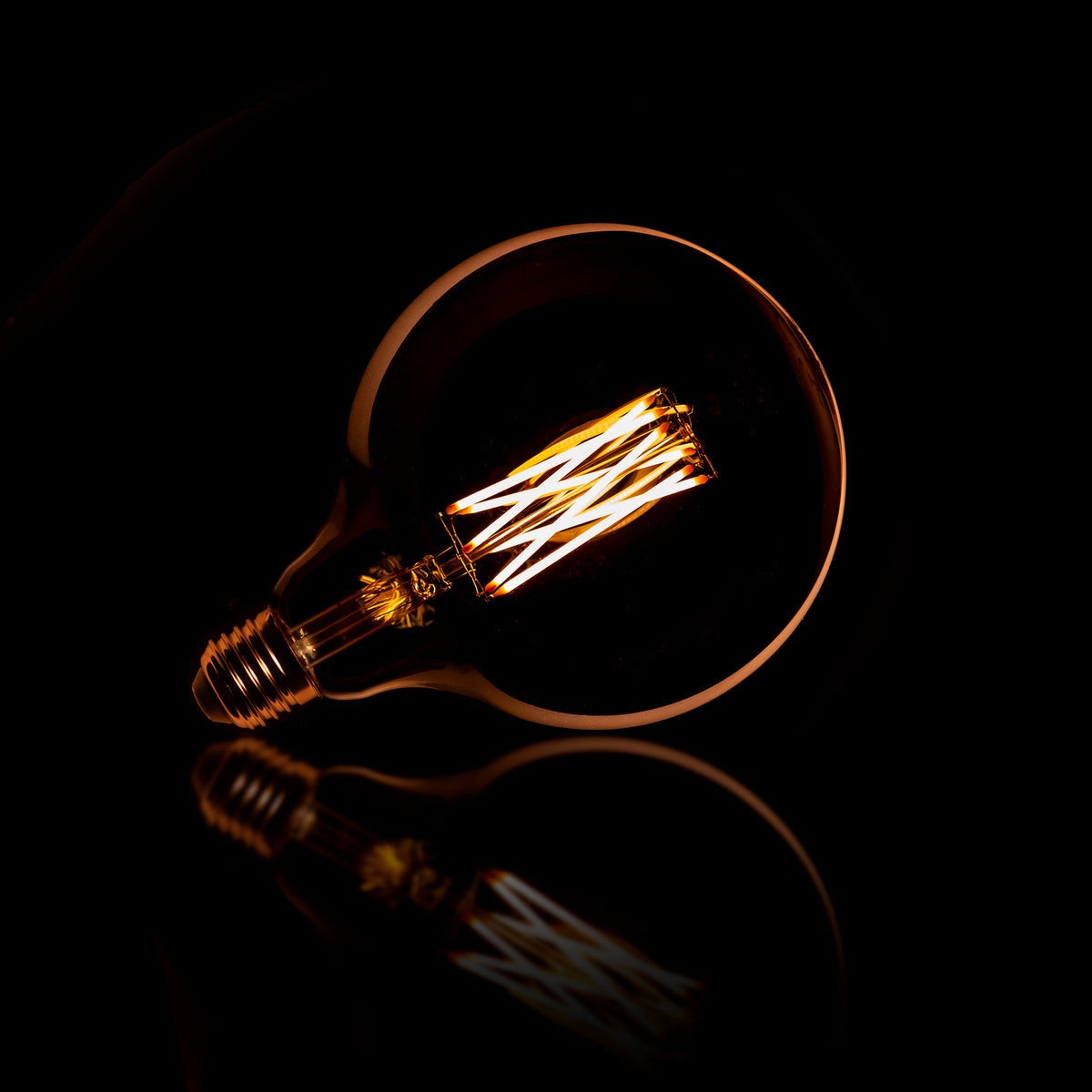 LED filamentlamp G125 bol diameter 12,5 cm - E27, amber glas, 2100K